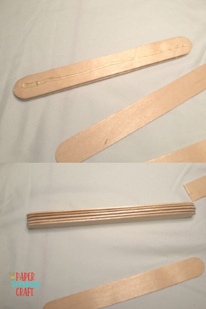 Stack of five popsicle sticks glued together.