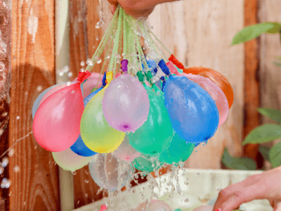 Water balloons being filled with water.