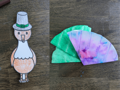 Coffee filters colored with markers next to the coffee filter turkey template.