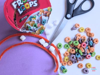 Supplies needed for pipe cleaner Froot Loops rainbow craft.