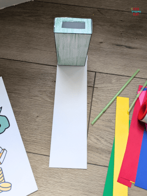 Leprechaun trap box with paper runway.