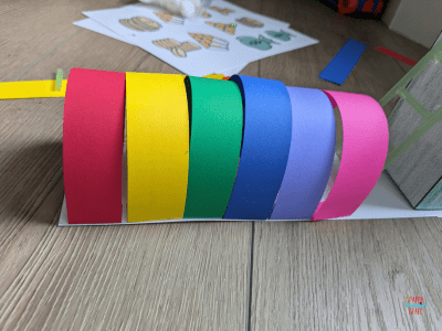 Rainbow arch made from construction paper.